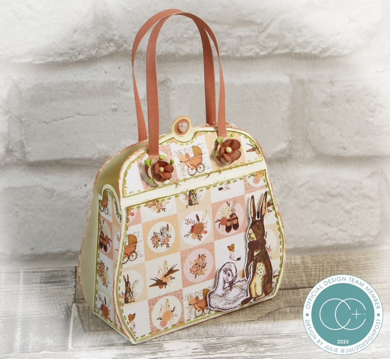 Patchwork-patterned handbag with floral and animal designs on a wooden surface