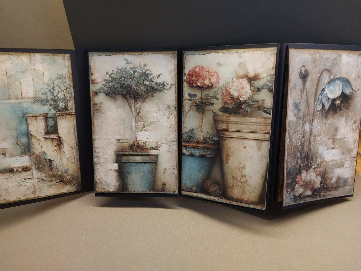 Set of four framed artworks with floral and architectural designs on a neutral background