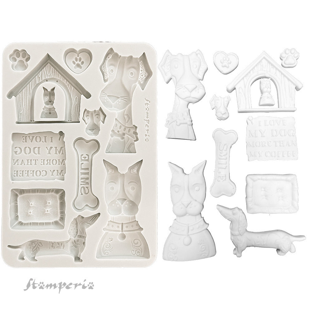 Set of white silicone mold shapes with dog-themed designs on a white background