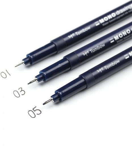 Three Tombow Mono Drawing fine-liner pens in dark navy blue, showing different tip sizes 01, 03, and 05, on a white background.