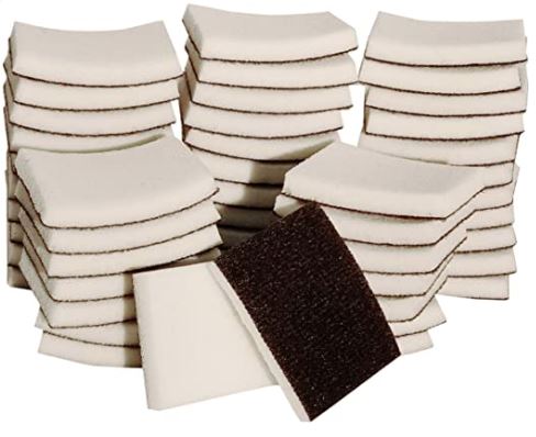 Multiple white and brown square replacement foam pads for Ranger ink blending tools on a white background