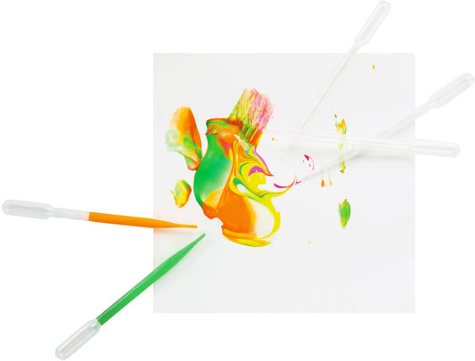 A single clear plastic pipette with a colorful paint splatter on it, surrounded by other clear pipettes on a white background.