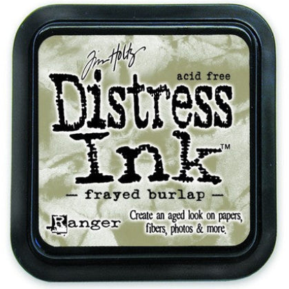 A Distress Ink Pad by Ranger, in a Frayed Burlap color, packaged in a black square container with a label showing the product name and the brand.