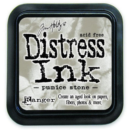 A square Tim Holtz Distress Ink pad in the color 'pumice stone', featuring a textured light gray and white paper pattern with a black border.